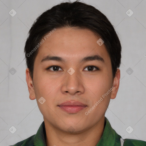 Joyful asian young-adult male with short  brown hair and brown eyes