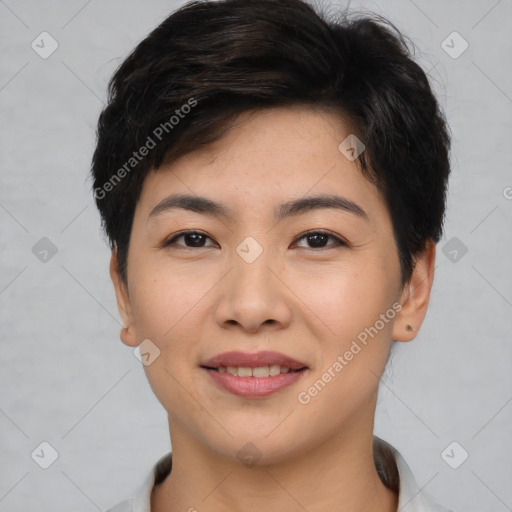 Joyful asian young-adult female with short  brown hair and brown eyes