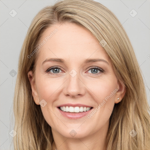 Joyful white young-adult female with long  brown hair and blue eyes