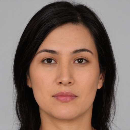 Neutral asian young-adult female with long  brown hair and brown eyes