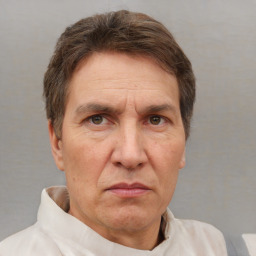 Neutral white adult male with short  brown hair and brown eyes