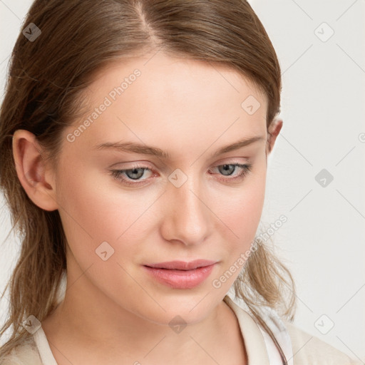 Joyful white young-adult female with medium  brown hair and blue eyes