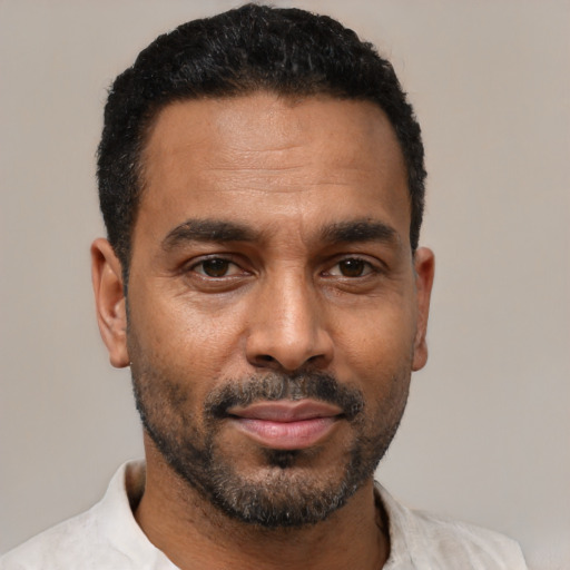 Neutral latino adult male with short  black hair and brown eyes