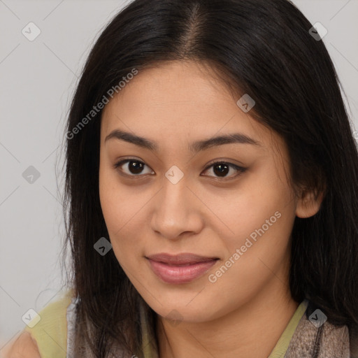 Joyful latino young-adult female with long  brown hair and brown eyes