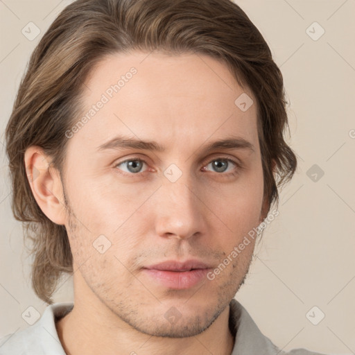 Neutral white young-adult male with short  brown hair and grey eyes