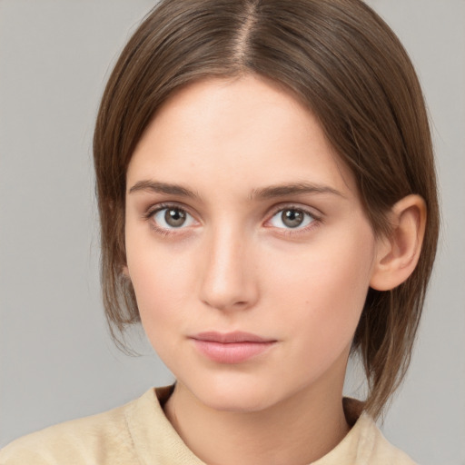 Neutral white young-adult female with medium  brown hair and brown eyes