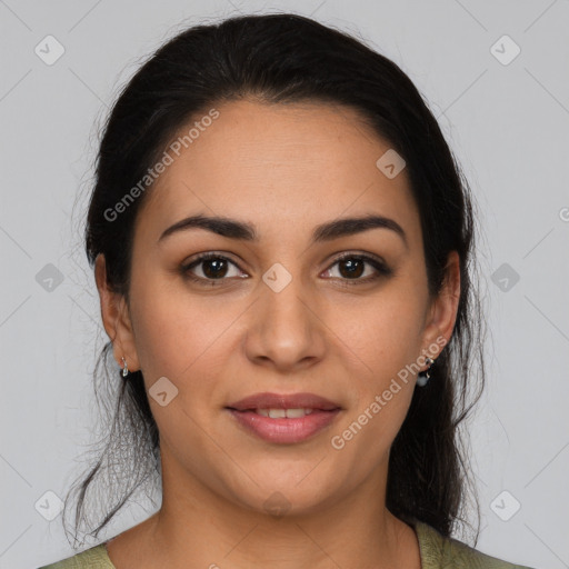 Joyful latino young-adult female with medium  brown hair and brown eyes