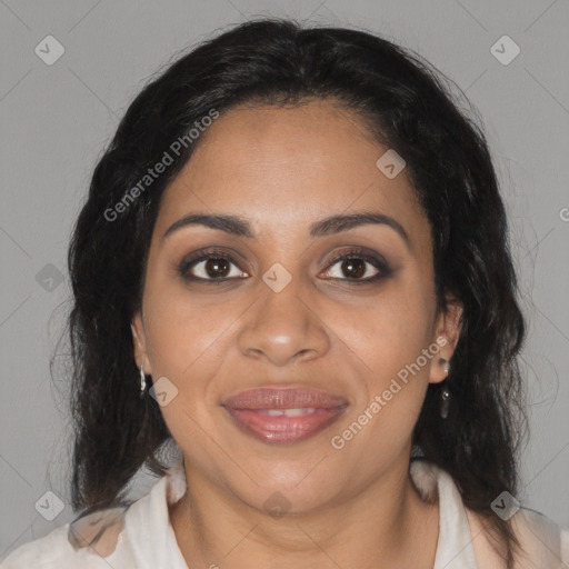 Joyful black adult female with medium  brown hair and brown eyes