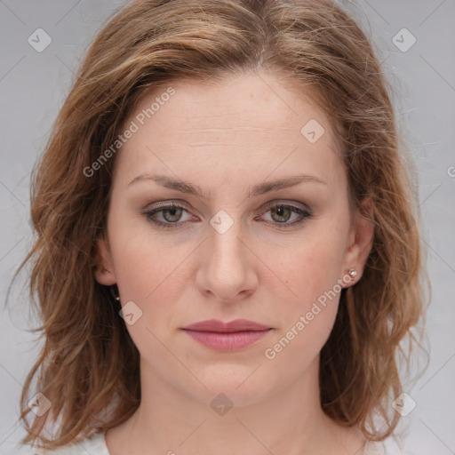 Joyful white young-adult female with medium  brown hair and blue eyes