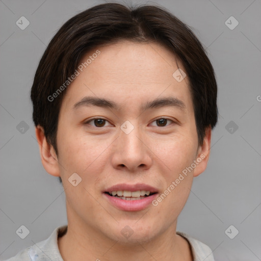 Joyful asian young-adult male with short  brown hair and brown eyes