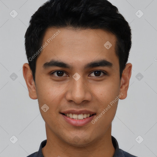 Joyful latino young-adult male with short  black hair and brown eyes