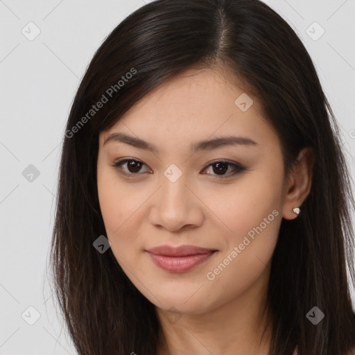 Joyful asian young-adult female with long  brown hair and brown eyes