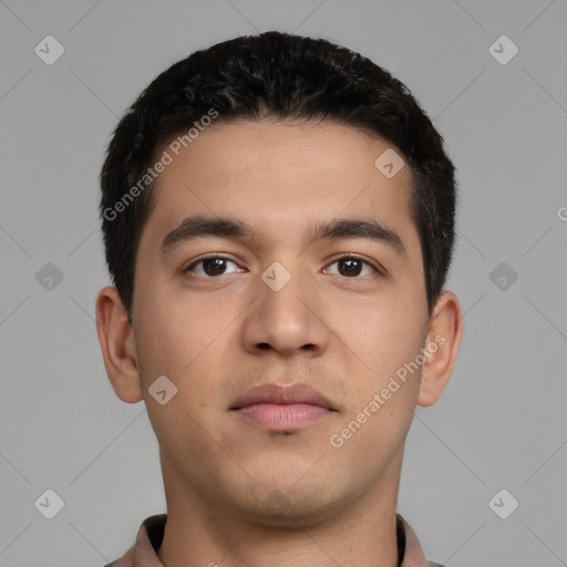Neutral latino young-adult male with short  black hair and brown eyes