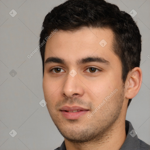 Neutral white young-adult male with short  black hair and brown eyes