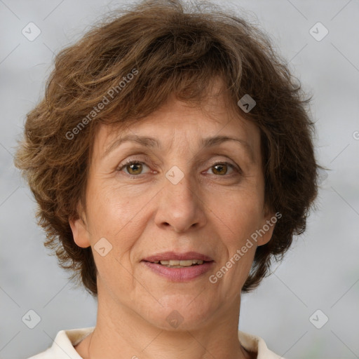 Joyful white adult female with short  brown hair and brown eyes