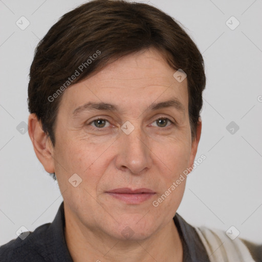 Joyful white adult female with short  brown hair and brown eyes