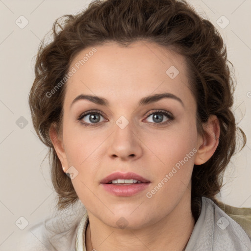 Joyful white young-adult female with medium  brown hair and green eyes