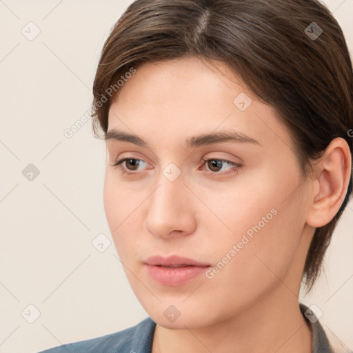 Neutral white young-adult female with medium  brown hair and brown eyes