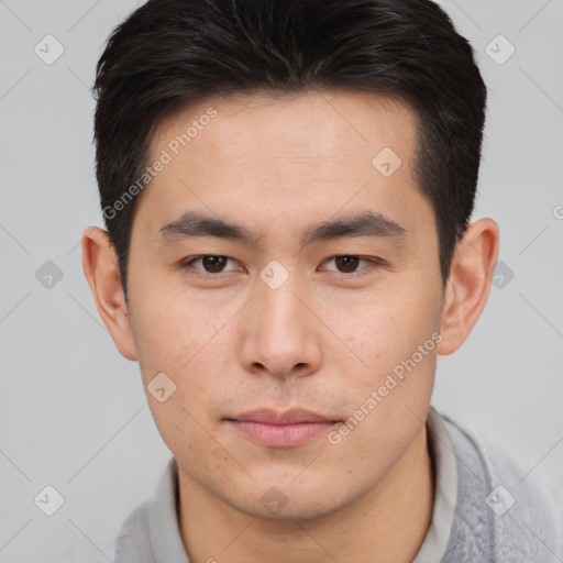 Neutral asian young-adult male with short  brown hair and brown eyes