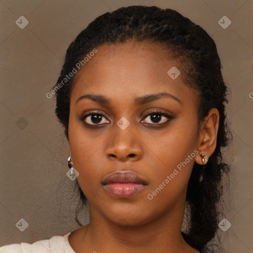 Neutral black young-adult female with medium  black hair and brown eyes