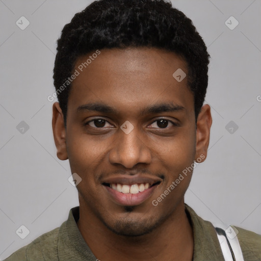 Joyful black young-adult male with short  brown hair and brown eyes