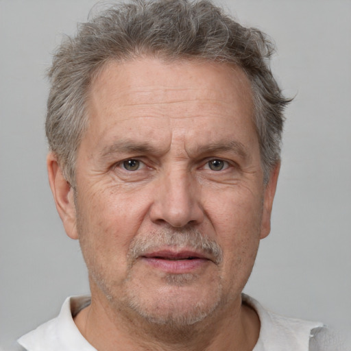 Neutral white middle-aged male with short  gray hair and brown eyes