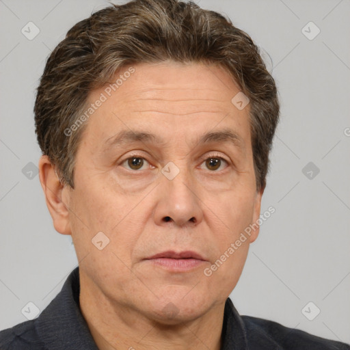 Joyful white middle-aged male with short  brown hair and brown eyes