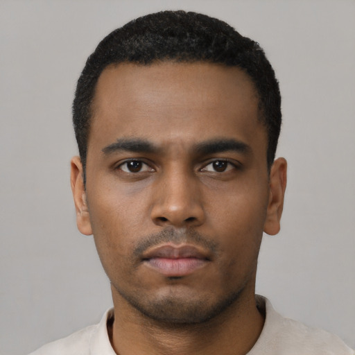 Neutral black young-adult male with short  black hair and brown eyes