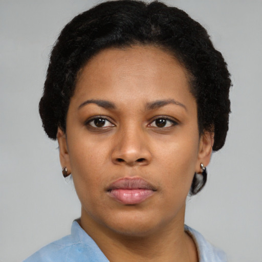 Neutral black young-adult female with short  black hair and brown eyes