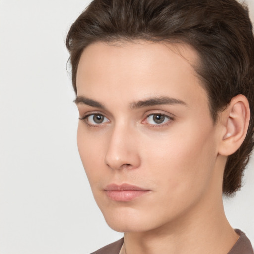 Neutral white young-adult female with short  brown hair and brown eyes