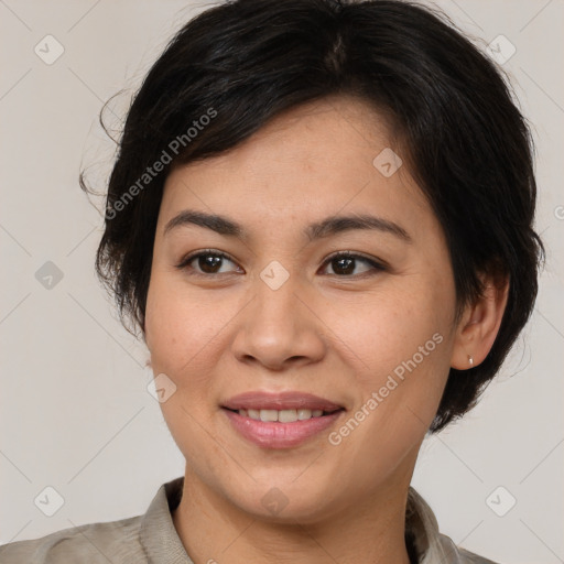 Joyful white young-adult female with medium  brown hair and brown eyes