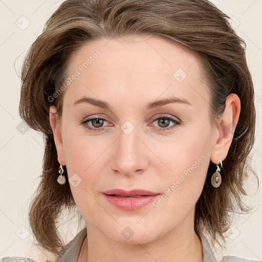 Joyful white young-adult female with medium  brown hair and blue eyes