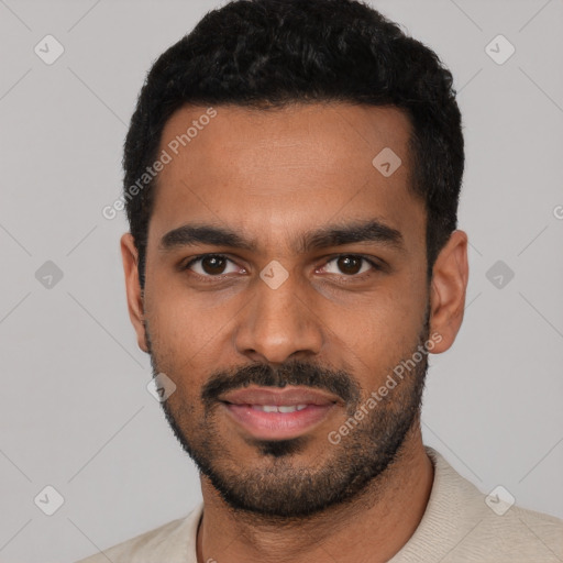 Joyful latino young-adult male with short  black hair and brown eyes