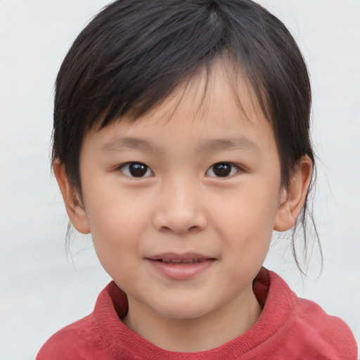 Joyful asian child female with medium  brown hair and brown eyes