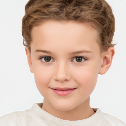 Joyful white child female with short  brown hair and brown eyes