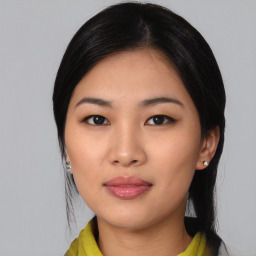 Joyful asian young-adult female with medium  black hair and brown eyes