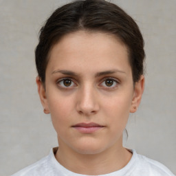 Neutral white young-adult female with short  brown hair and brown eyes