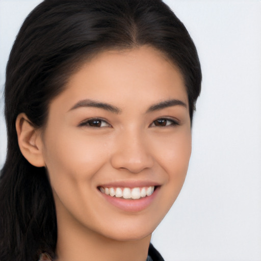 Joyful asian young-adult female with long  brown hair and brown eyes