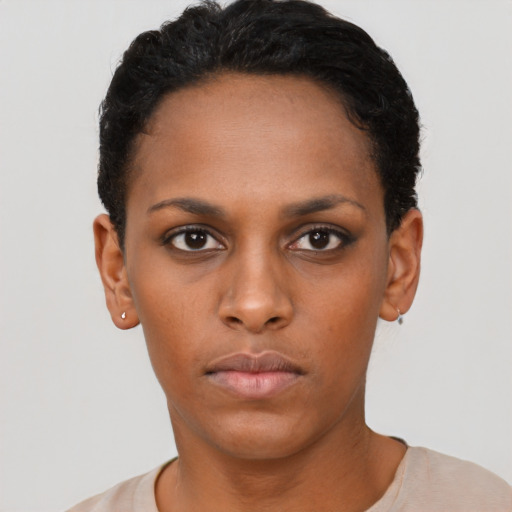Neutral black young-adult female with short  black hair and brown eyes