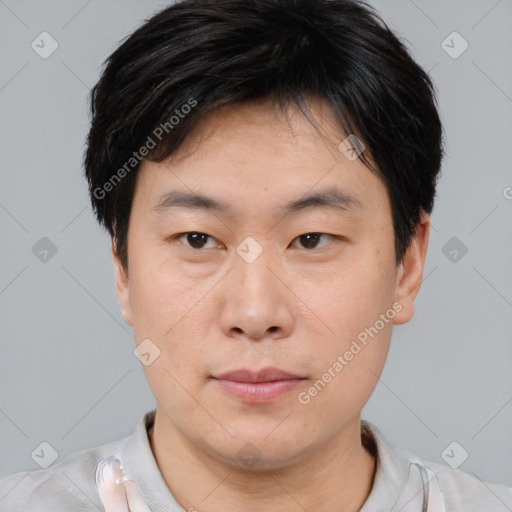 Neutral asian young-adult male with short  brown hair and brown eyes