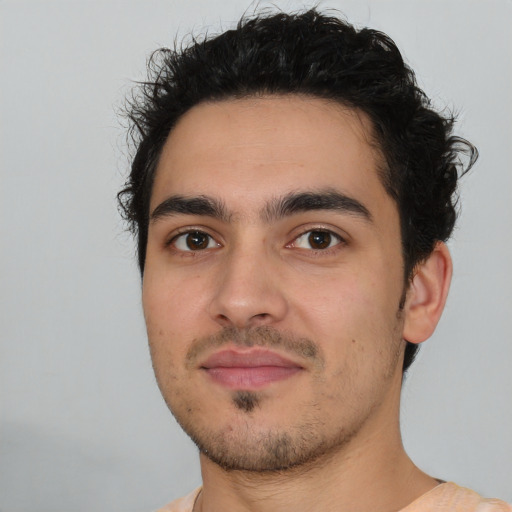 Neutral white young-adult male with short  black hair and brown eyes