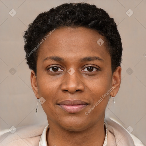 Joyful black young-adult female with short  brown hair and brown eyes