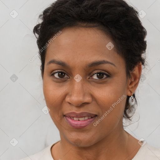 Joyful latino young-adult female with short  brown hair and brown eyes