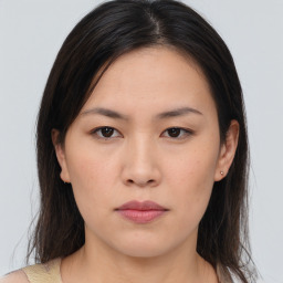 Neutral asian young-adult female with medium  brown hair and brown eyes