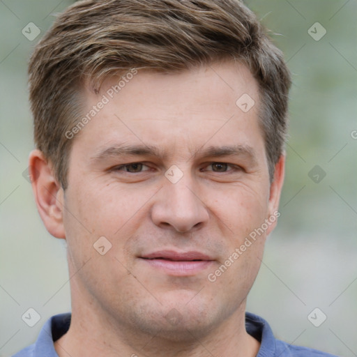 Joyful white adult male with short  brown hair and grey eyes