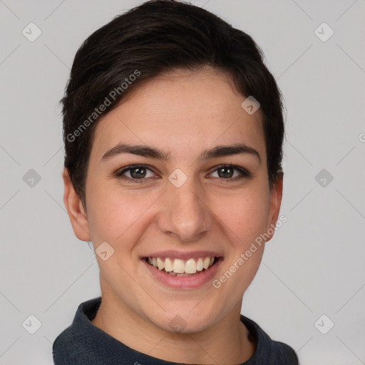 Joyful white young-adult female with short  brown hair and brown eyes