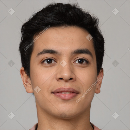 Joyful latino young-adult male with short  brown hair and brown eyes