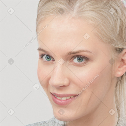 Joyful white young-adult female with medium  brown hair and blue eyes