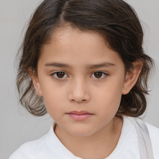 Neutral white child female with medium  brown hair and brown eyes