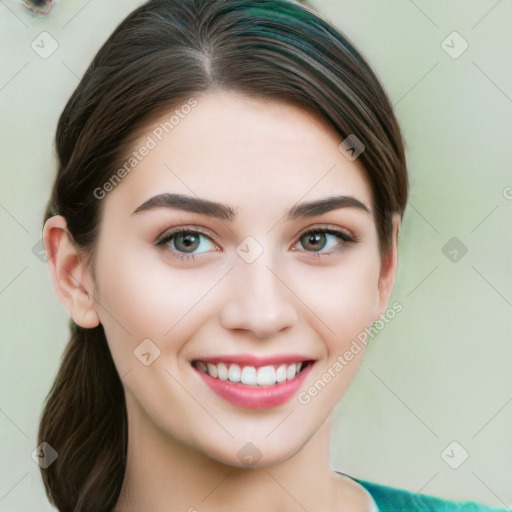 Joyful white young-adult female with long  brown hair and green eyes